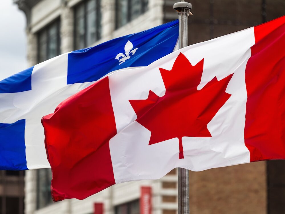 MONTREAL, QUE.: AUGUST 28, 2014 -- The Quebec and Canadian flags in Montreal, on Thursday, August 28, 2014. (Dave Sidaway / THE GAZETTE)